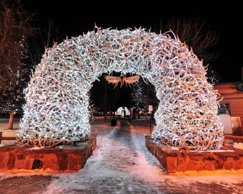 Famous elk arch in Jackson hole WY at Night with Christmas lights